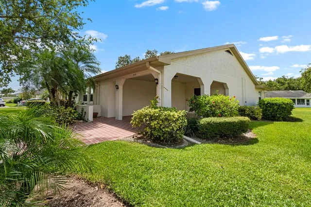 a view of a back yard of the house