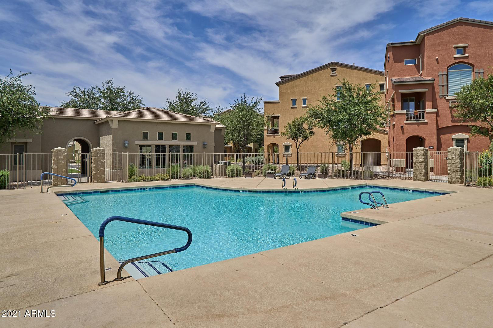 240 West Juniper Avenue, Unit 1089 Gilbert, AZ 85233 - Photo 21 of 24 front view of a house with a yard