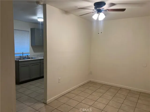 a view of a storage & utility room with a sink