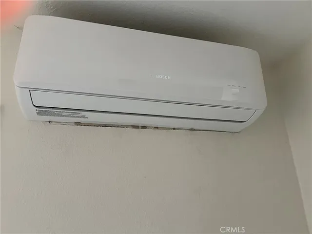 a potted plant sitting in front of a house