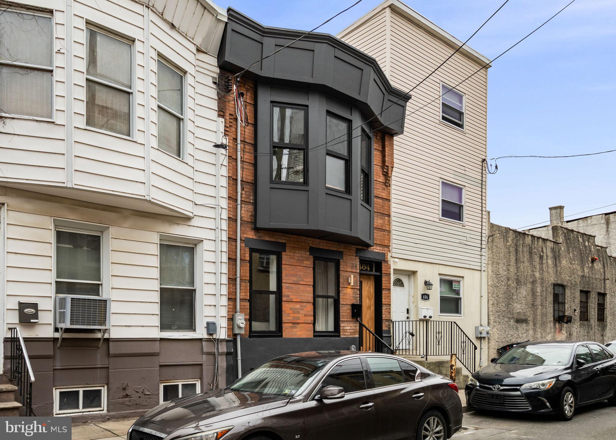 404 Pierce Street Philadelphia, PA 19148 - Photo 2 of 31 a view of a car park in front of a building