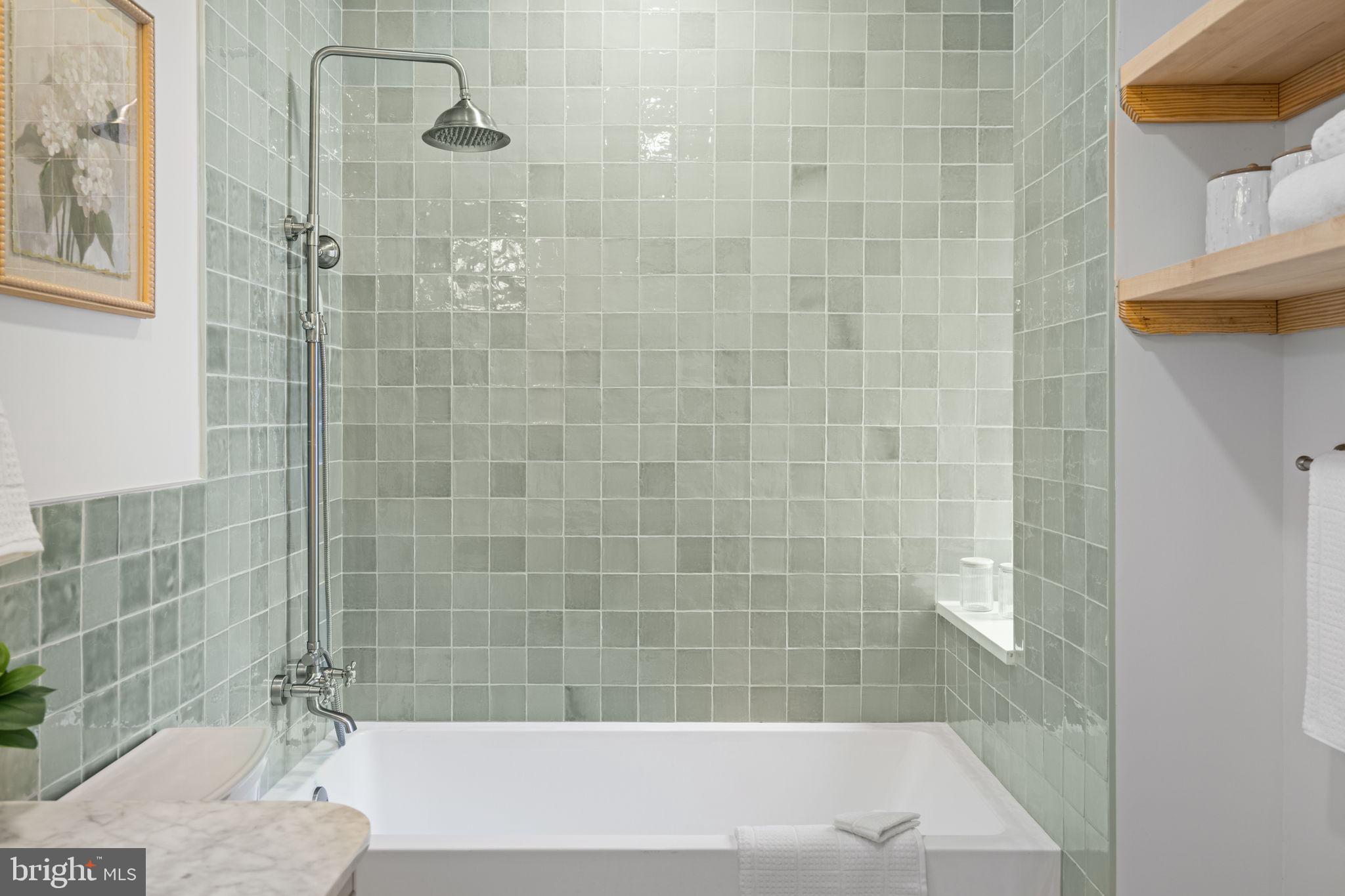 404 Pierce Street Philadelphia, PA 19148 - Photo 22 of 31 a bathroom with a shower and a sink