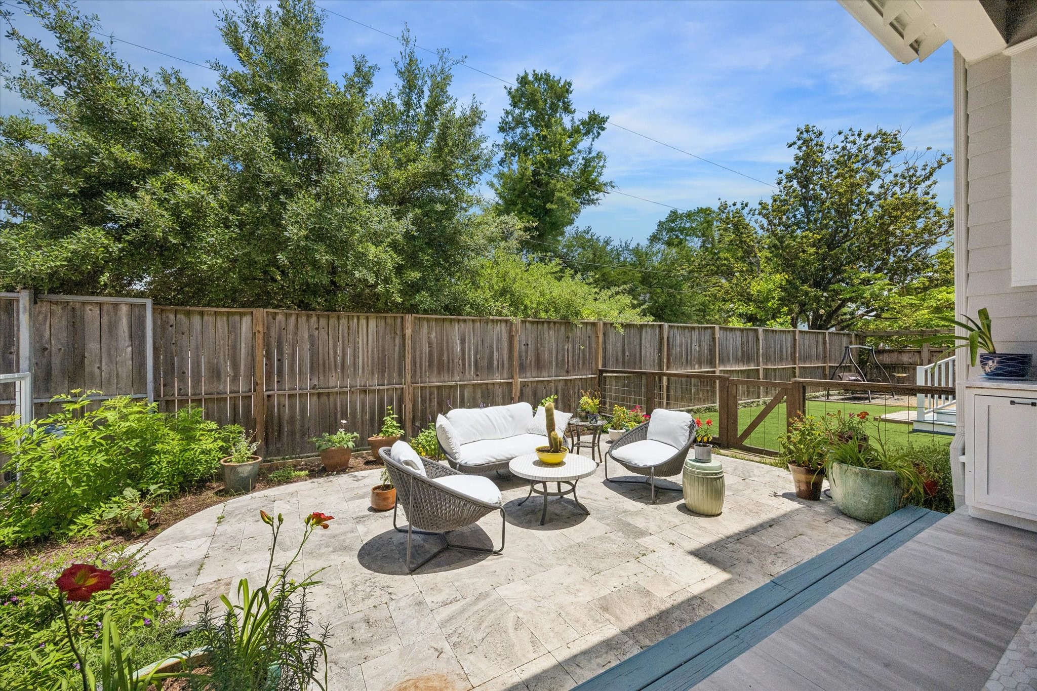 1101 Omar Street Houston, TX 77009 - Photo 37 of 46 Thoughtfully designed outdoor sitting areas create the perfect setting for morning coffee, outdoor dinners, relaxing evenings, and gathering with family and friends.