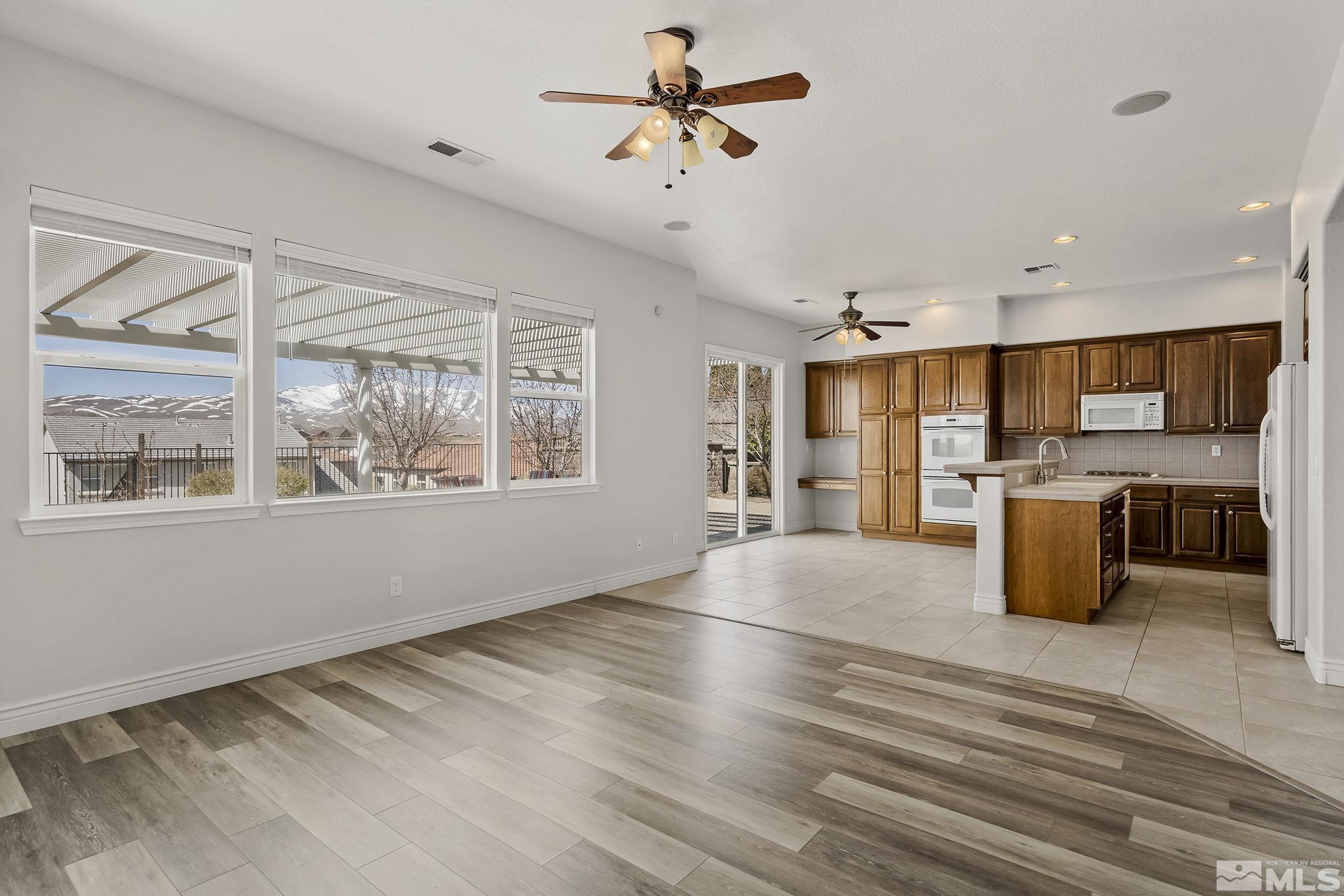 8115 Fire Opal Lane Reno, NV 89506 - Photo 11 of 40 a view of kitchen with furniture and window
