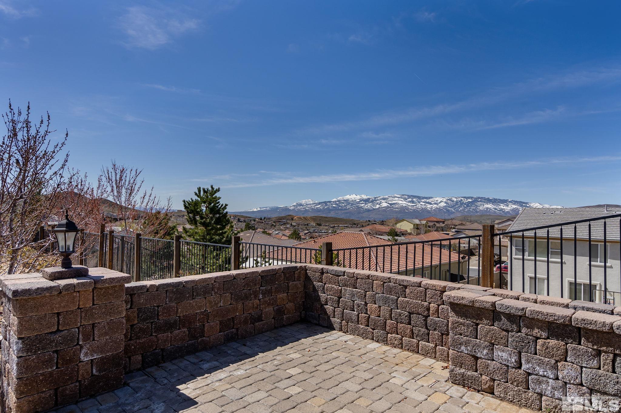 8115 Fire Opal Lane Reno, NV 89506 - Photo 34 of 40 a view of a balcony with furniture