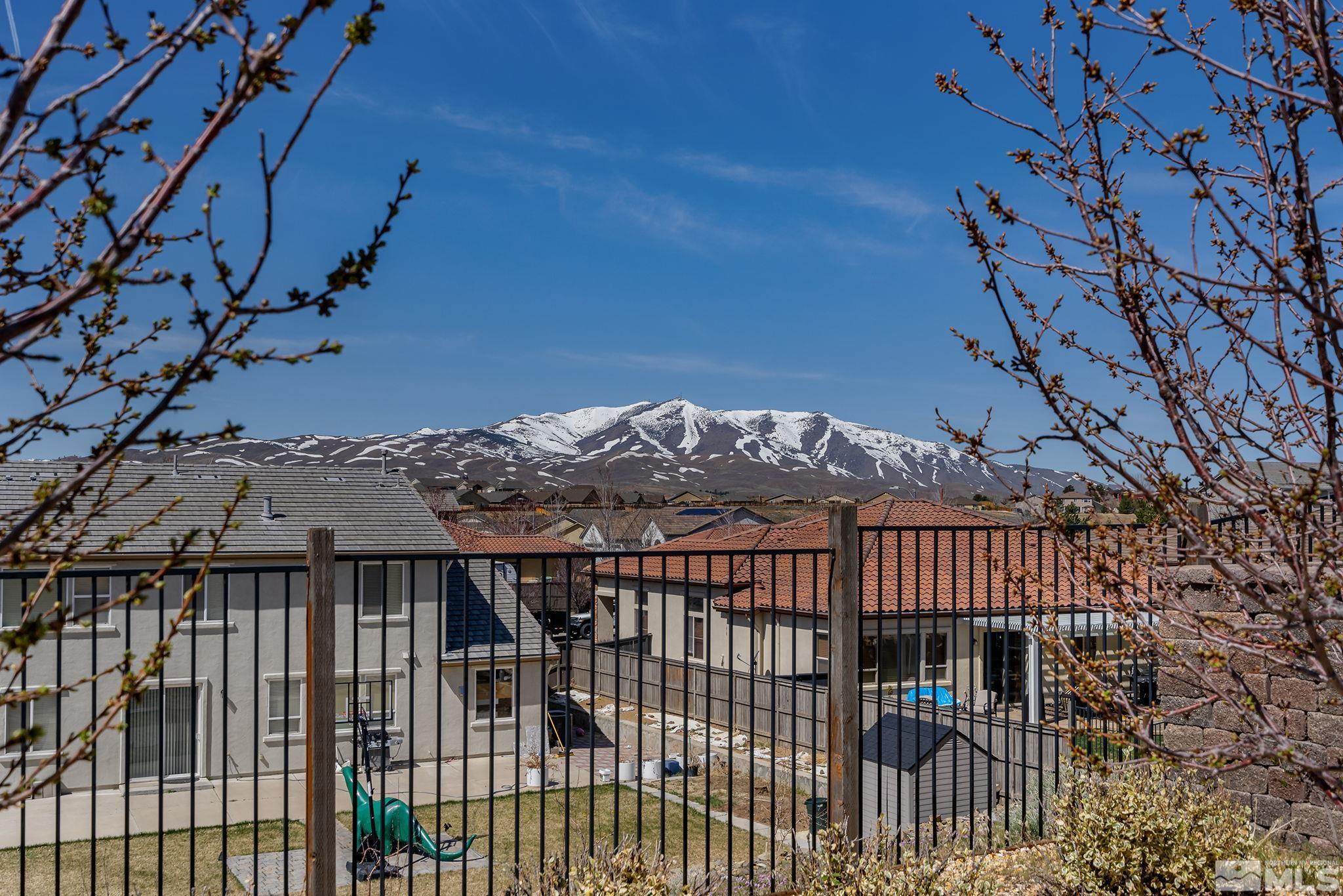 8115 Fire Opal Lane Reno, NV 89506 - Photo 35 of 40 a view of balcony with wooden floor