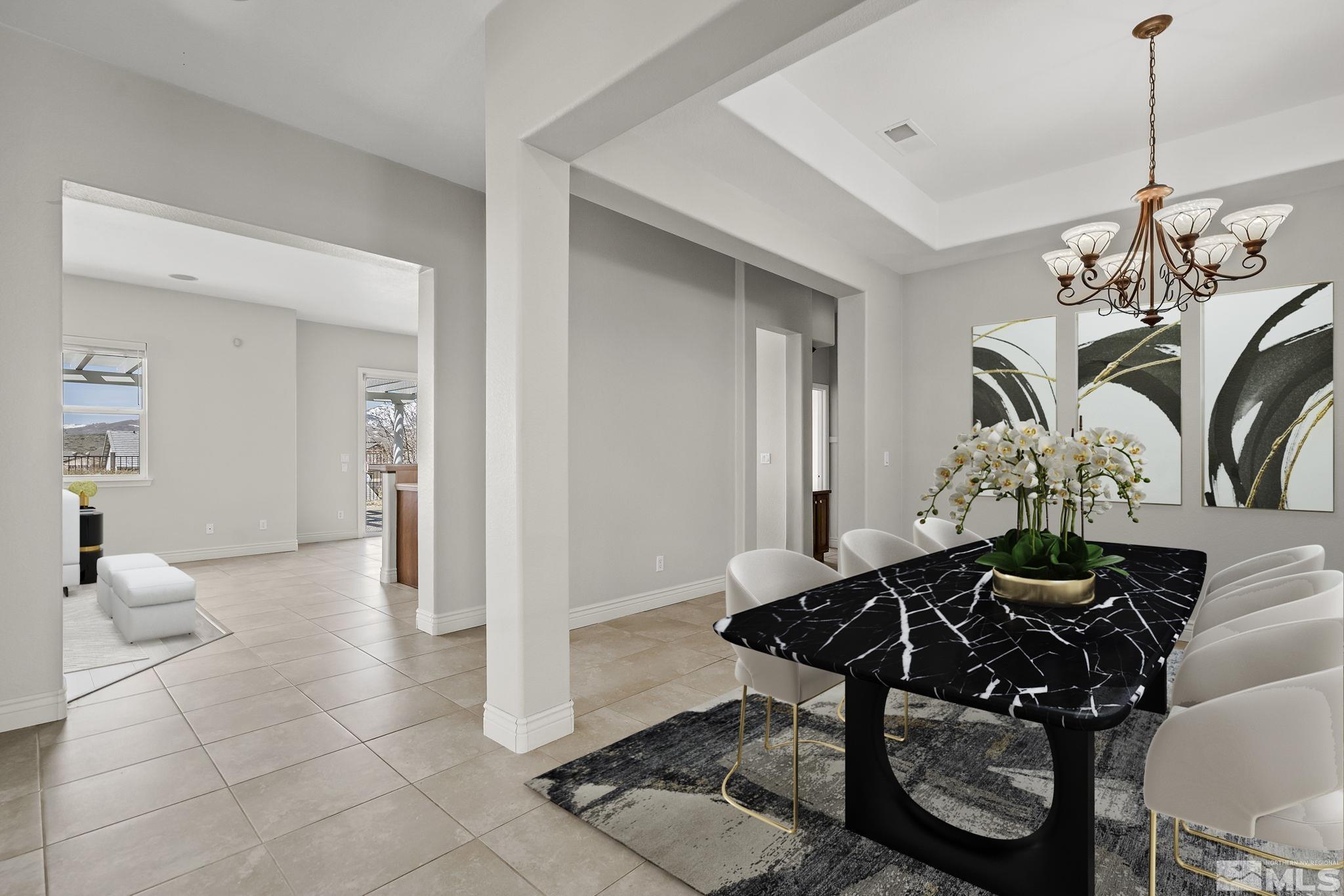 8115 Fire Opal Lane Reno, NV 89506 - Photo 6 of 40 a view of a livingroom with furniture and floor to ceiling window