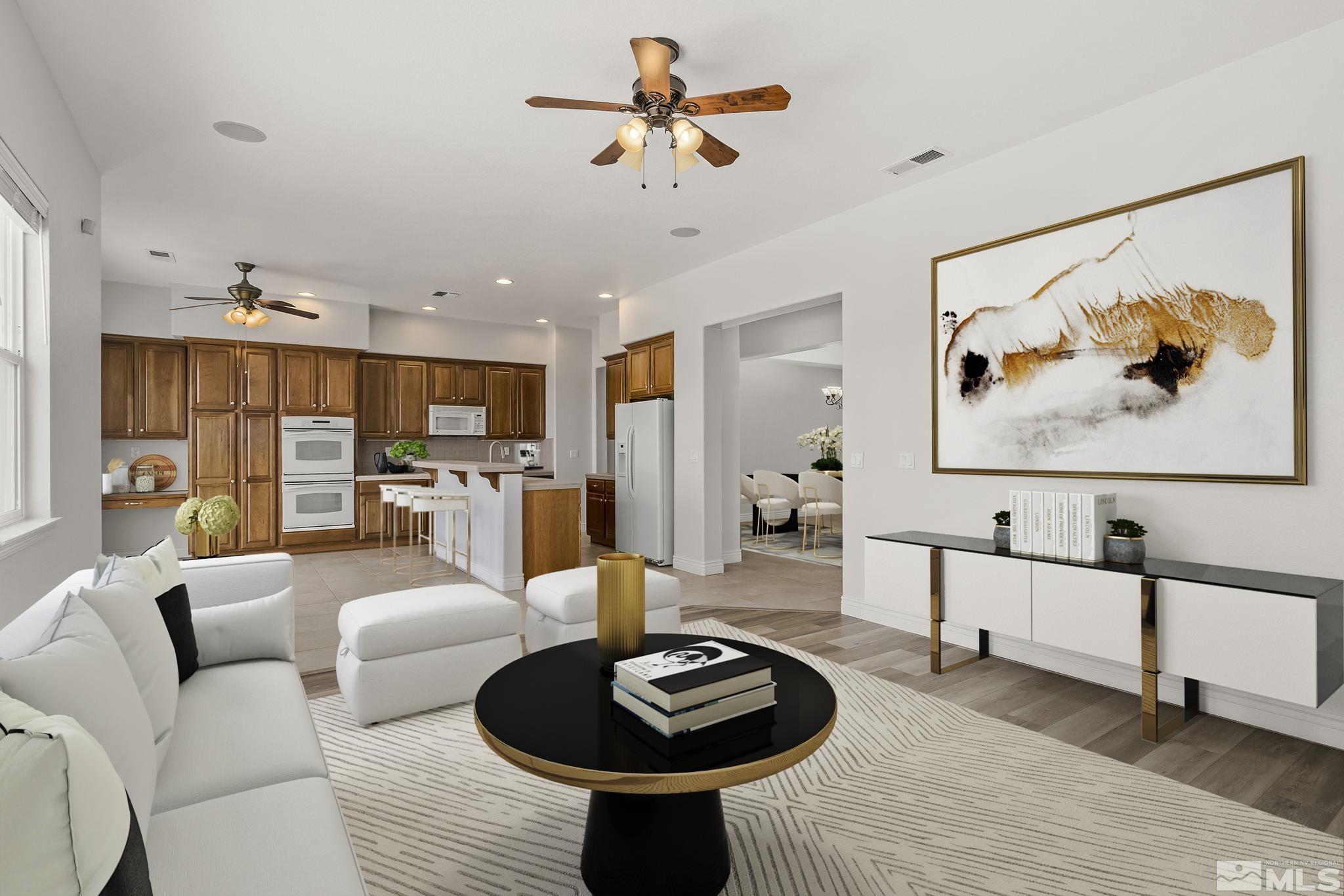 8115 Fire Opal Lane Reno, NV 89506 - Photo 9 of 40 a living room with furniture and a view of kitchen