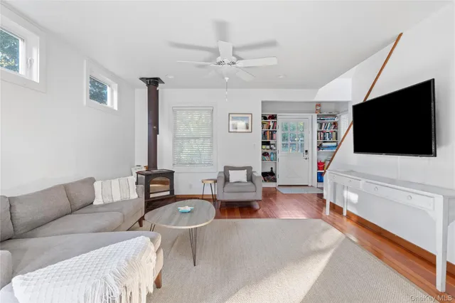 a front view of house with yard outdoor seating and barbeque oven