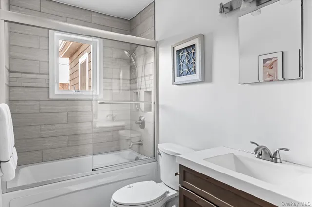 a living room with furniture a bed and a couch