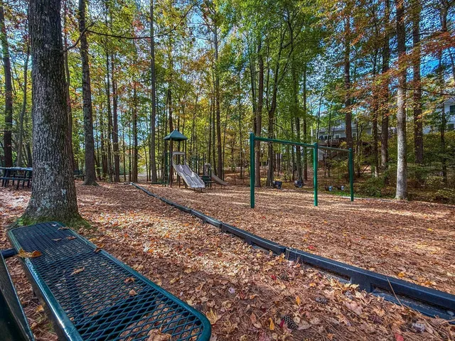 a view of a backyard with trees