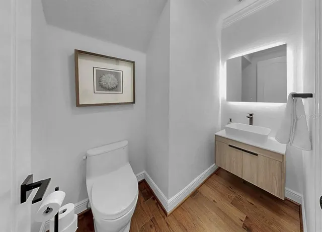 a bed room with a bed and a large window