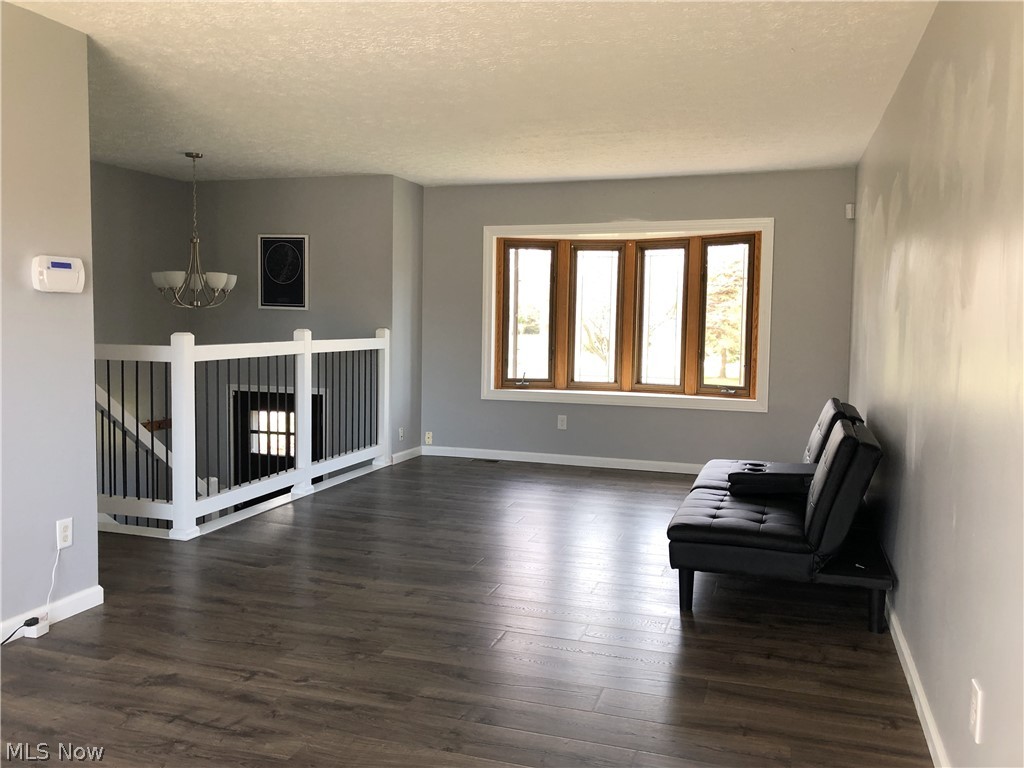2775 McMackin Road Madison, OH 44057 - Photo 8 of 24 LIVING ROOM IS OPEN TO DINING ROOM AND KITCHEN