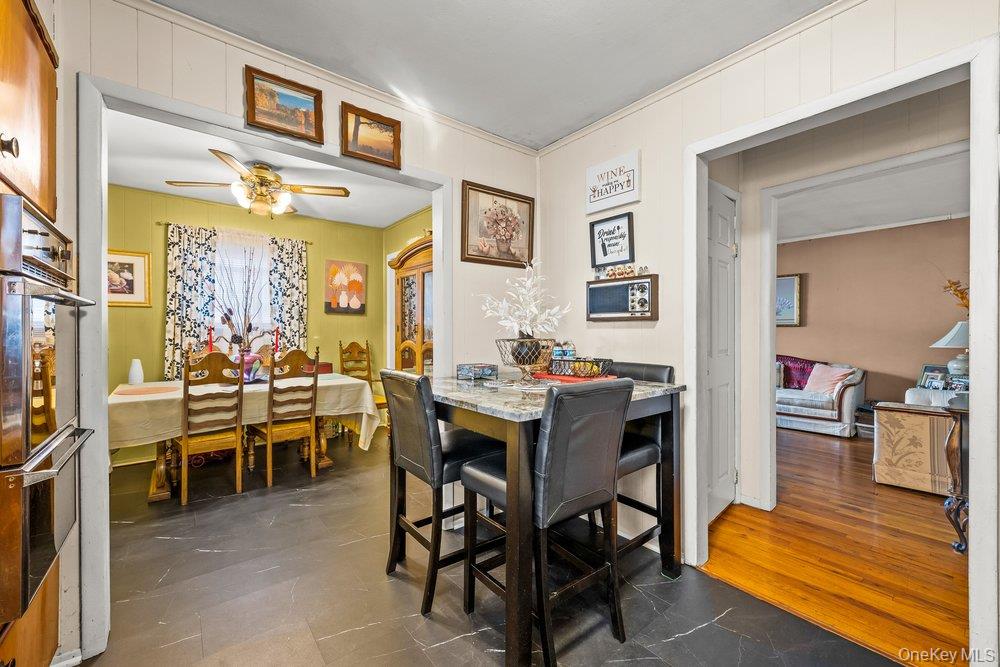 145-95 221st Street Queens, NY 11413 - Photo 9 of 38 a view of a dining room with furniture