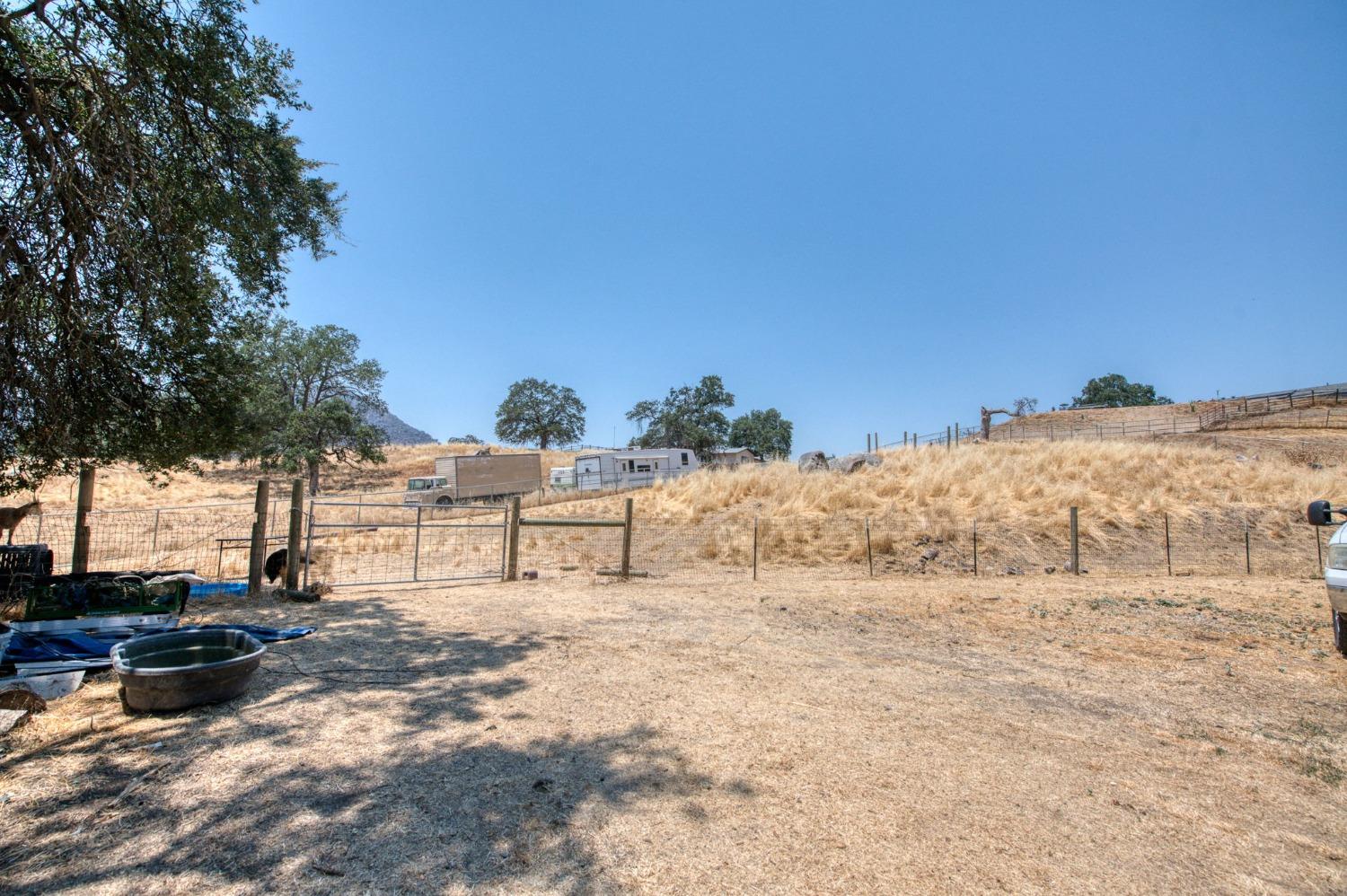 6980 Chaparral Drive Sanger, CA 93657 - Photo 15 of 41 a view of a lake with a mountain