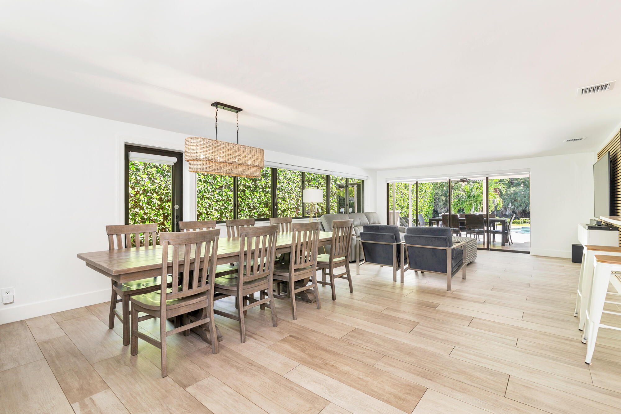 7730 Beta Circle Lake Clarke Shores, FL 33406 - Photo 35 of 50 a dining room with furniture window and outside view
