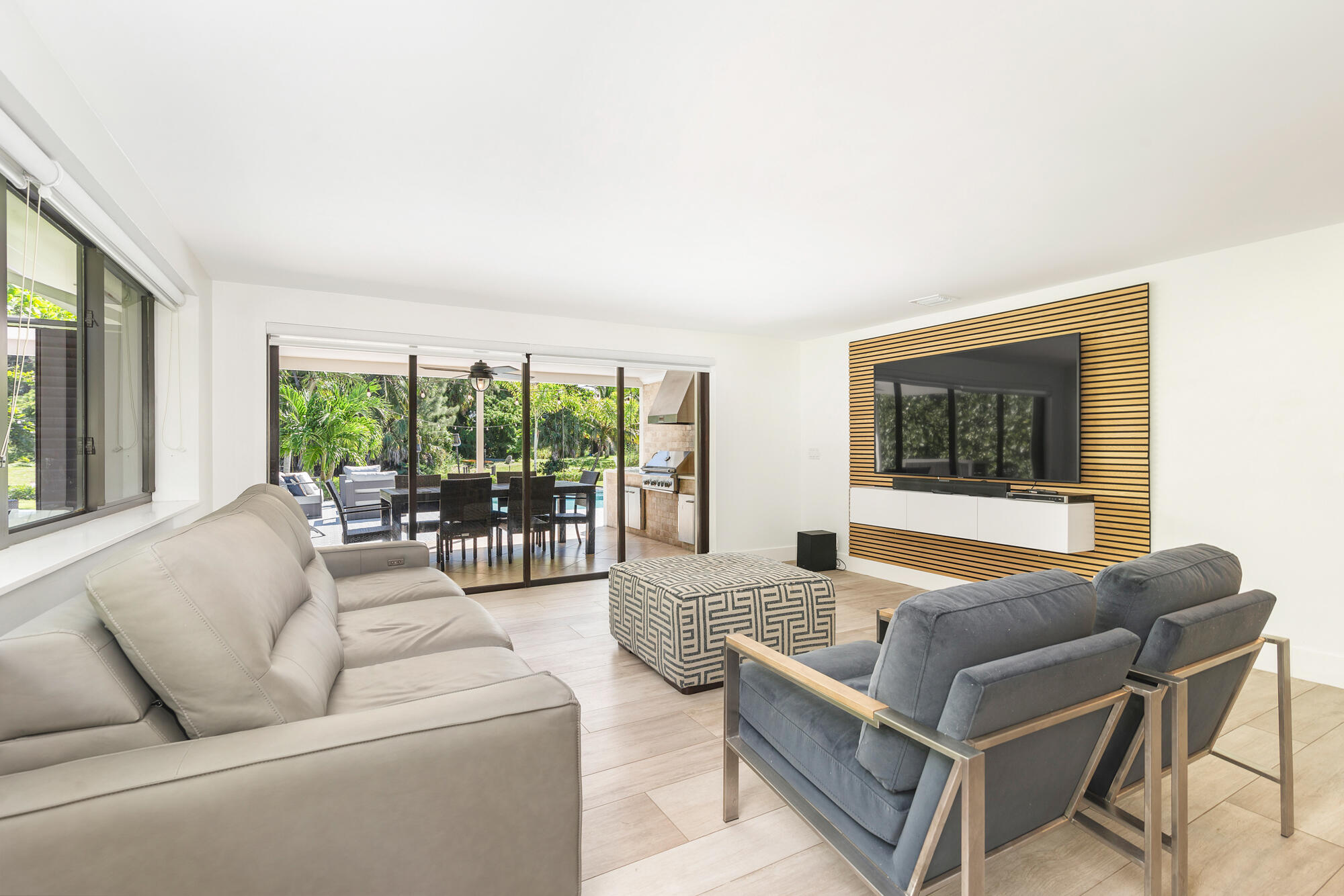 7730 Beta Circle Lake Clarke Shores, FL 33406 - Photo 38 of 50 a living room with furniture and a large window