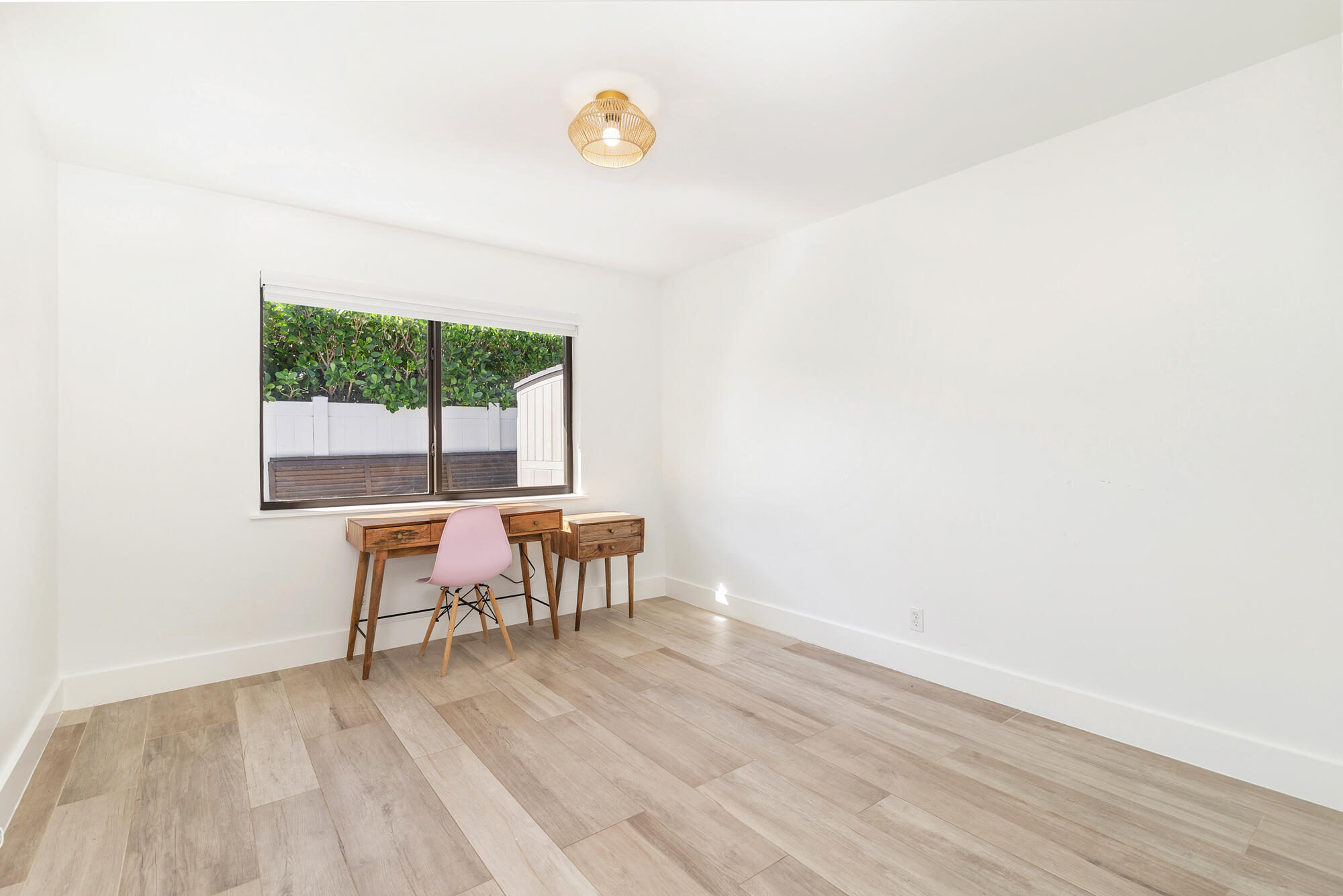 7730 Beta Circle Lake Clarke Shores, FL 33406 - Photo 45 of 50 a view of a room with a table and chairs