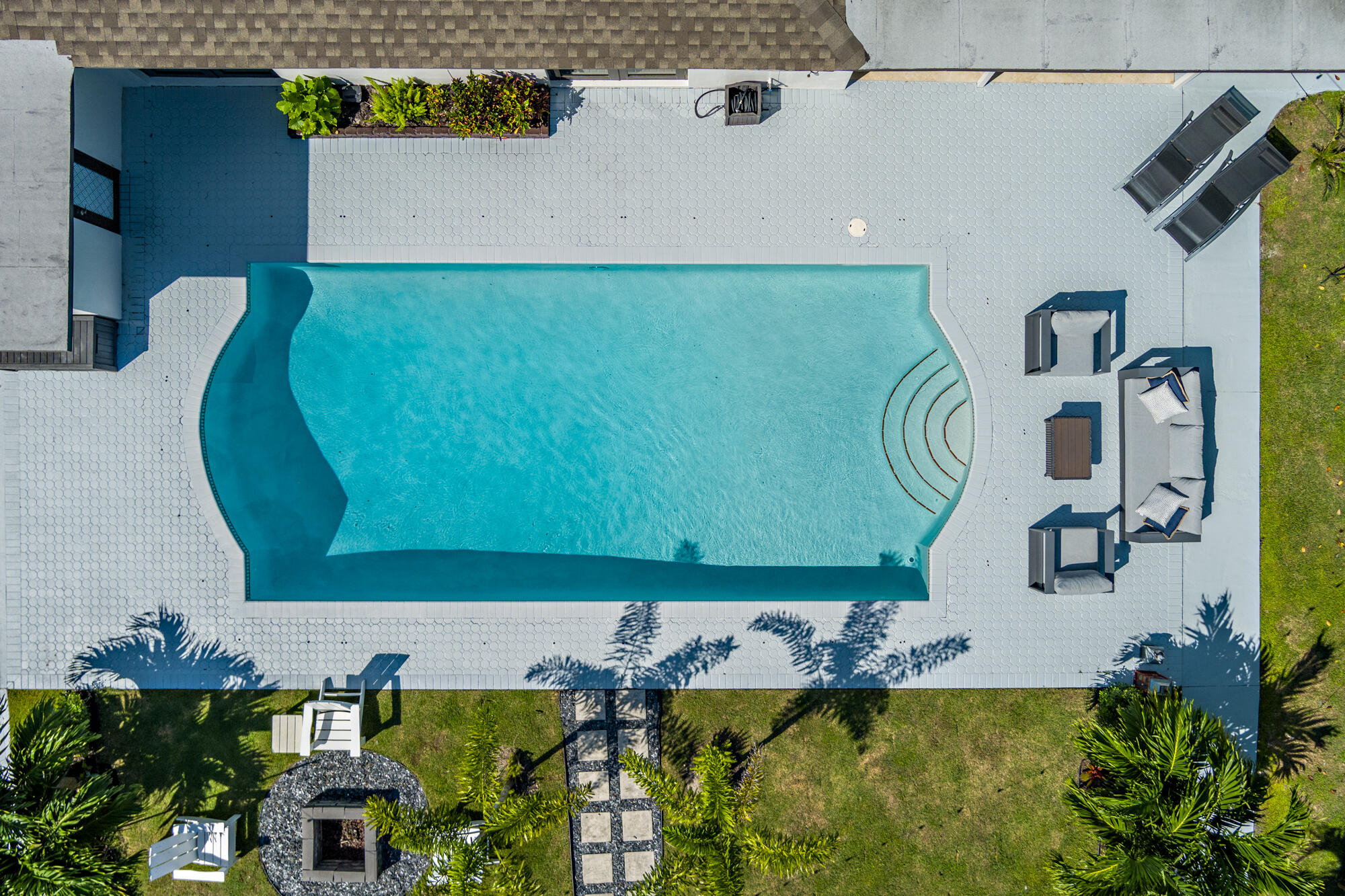 7730 Beta Circle Lake Clarke Shores, FL 33406 - Photo 50 of 50 a view of swimming pool outdoor seating