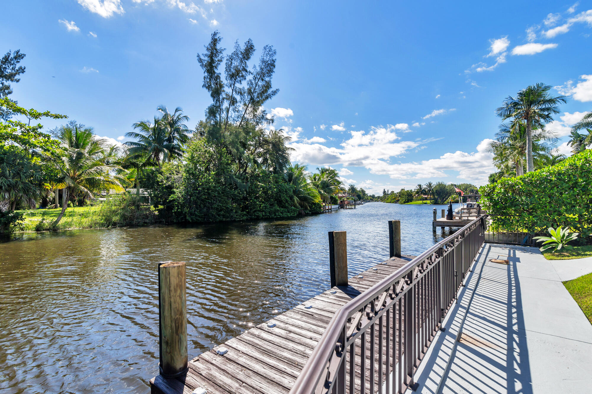 7730 Beta Circle Lake Clarke Shores, FL 33406 - Photo 6 of 50 a view of a balcony with wooden floor
