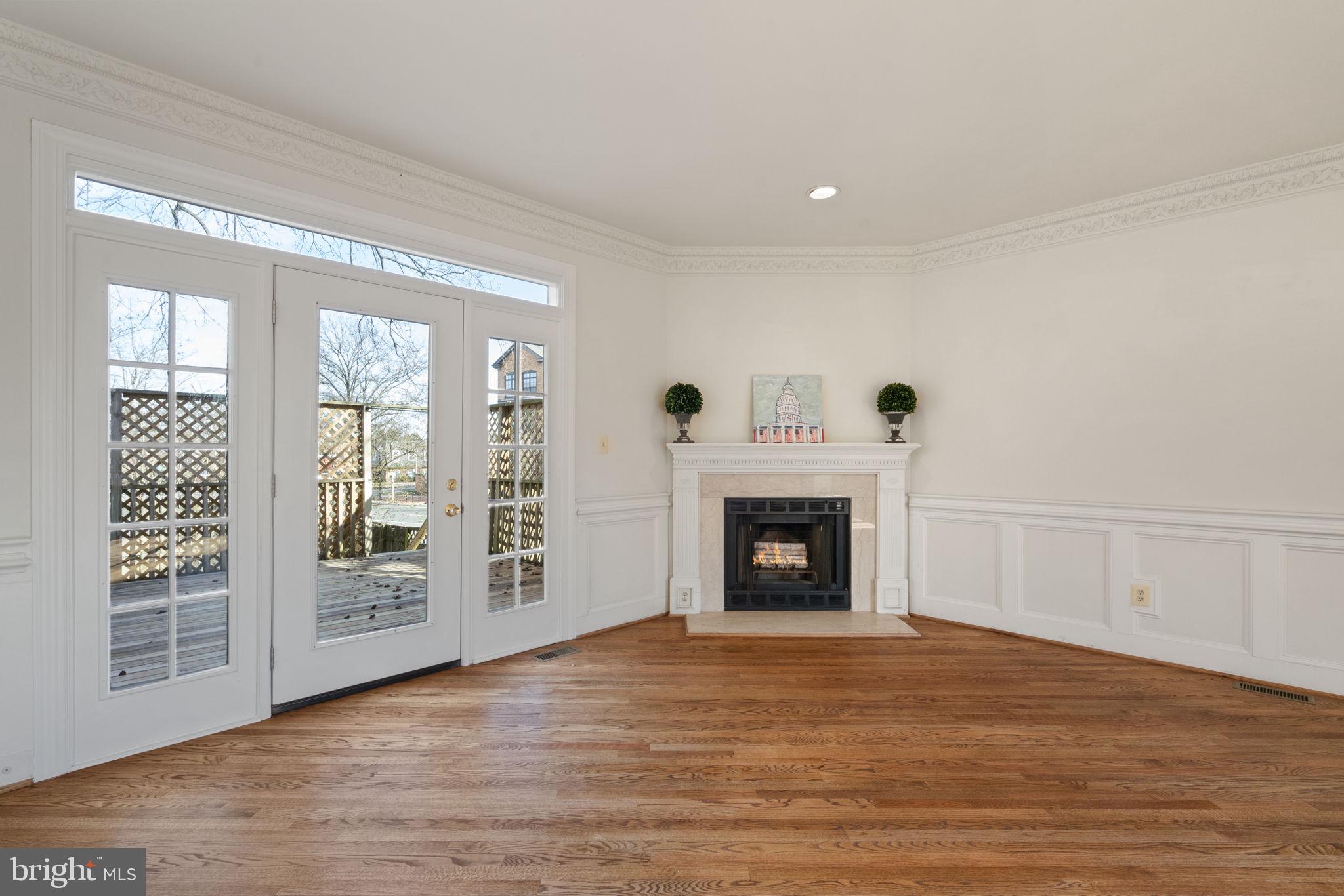 1537 Cedar Avenue McLean, VA 22101 - Photo 16 of 54 a view of an empty room with glass door and a window