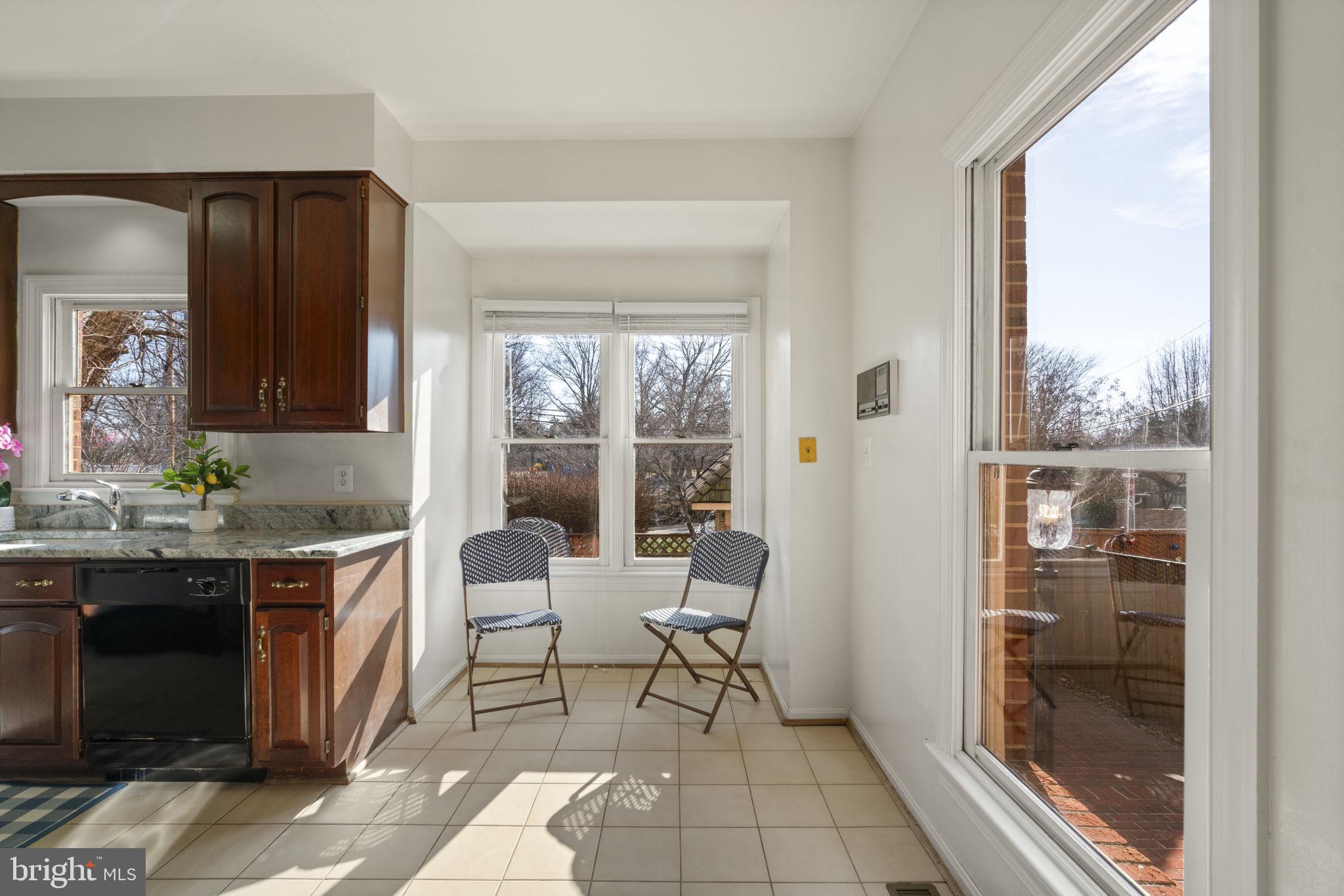 1537 Cedar Avenue McLean, VA 22101 - Photo 21 of 54 a living room with granite countertop furniture and a fireplace
