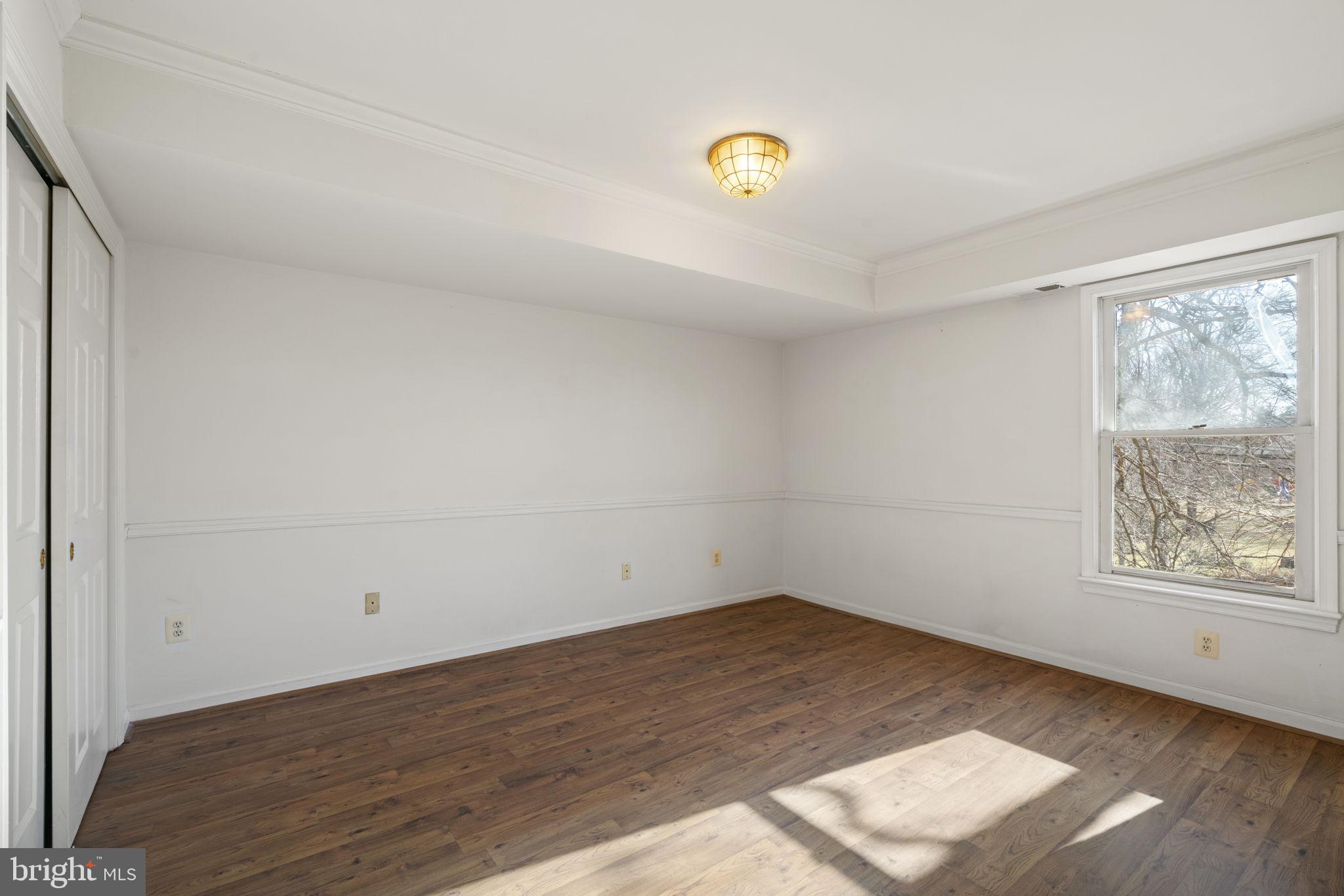 1537 Cedar Avenue McLean, VA 22101 - Photo 24 of 54 wooden floor in an empty room with a window
