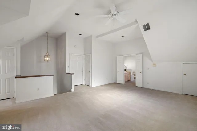 a kitchen with a sink and a stove top oven