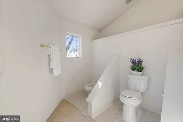 a view of room garage and windows