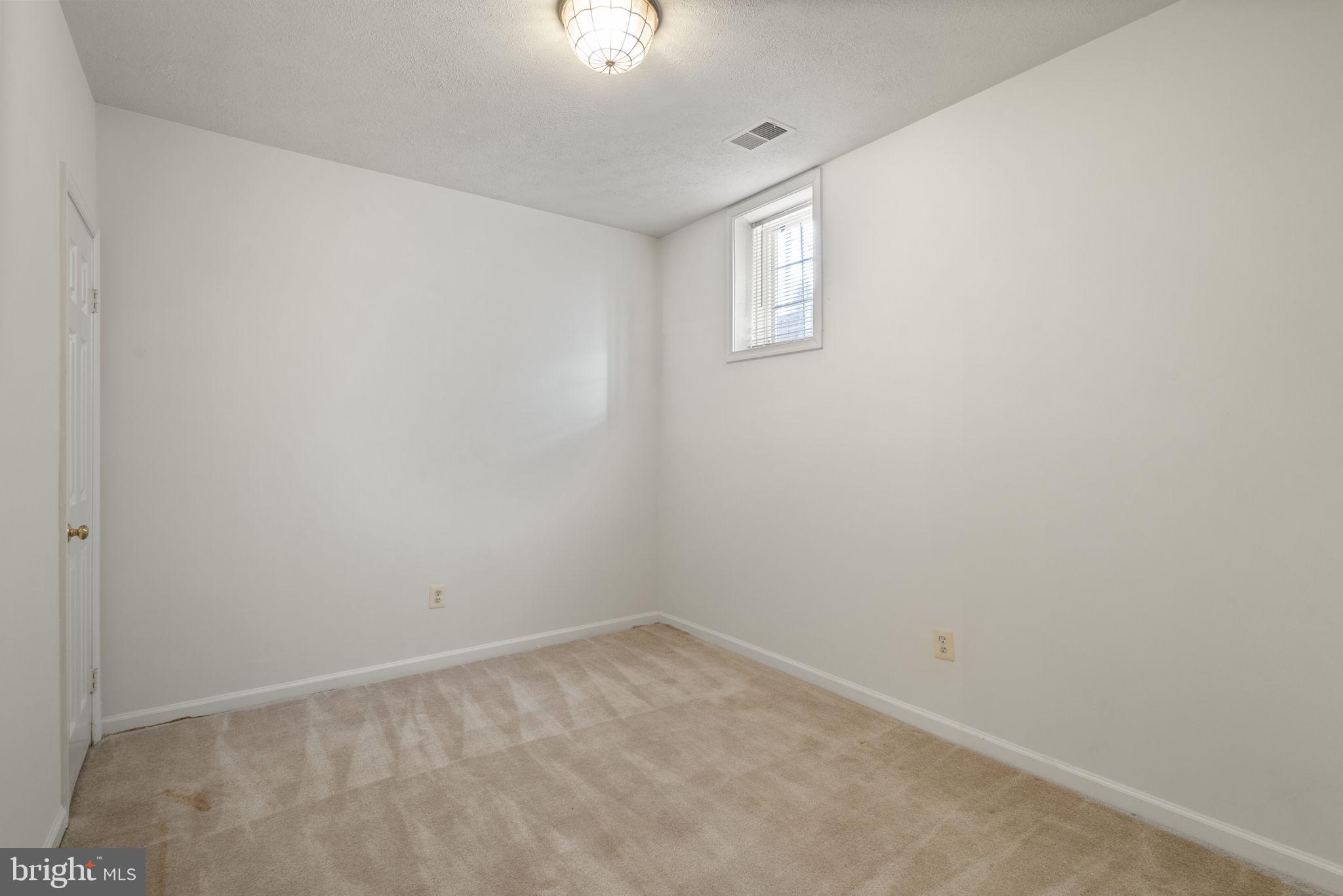 1537 Cedar Avenue McLean, VA 22101 - Photo 49 of 54 an empty room with a window