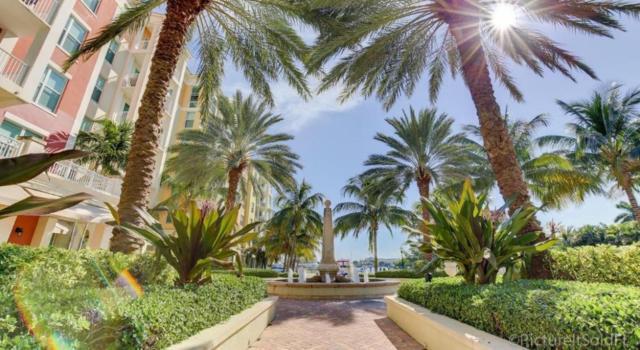 802 West Windward Way, Unit 211 Lantana, FL 33462 - Photo 6 of 32 a view of outdoor space with a palm tree