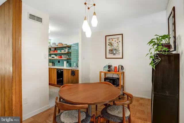 a view of a dining room with furniture