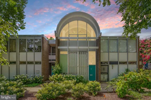 a view of a garden with a pathway