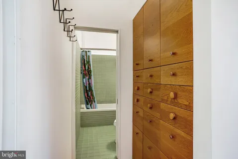 a view of a bathroom from a hallway