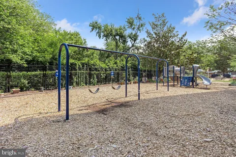 a view of a park with swings
