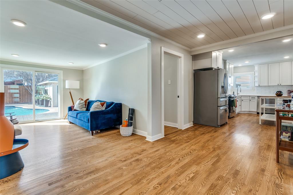 4245 Concho Street Dallas, TX 75206 - Photo 13 of 30 Living area with ornamental molding, plenty of natural light, light wood-type flooring, and recessed lighting