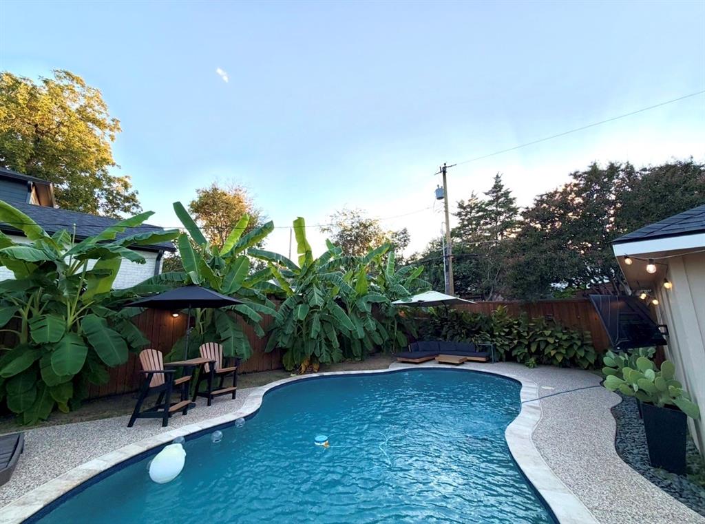 4245 Concho Street Dallas, TX 75206 - Photo 24 of 30 View of pool featuring a fenced backyard and patio surround