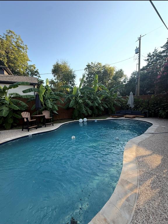 4245 Concho Street Dallas, TX 75206 - Photo 28 of 30 Outdoor pool featuring a fenced backyard and a patio area