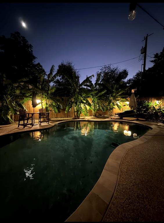 4245 Concho Street Dallas, TX 75206 - Photo 30 of 30 View of pool with a fenced backyard and patio surround