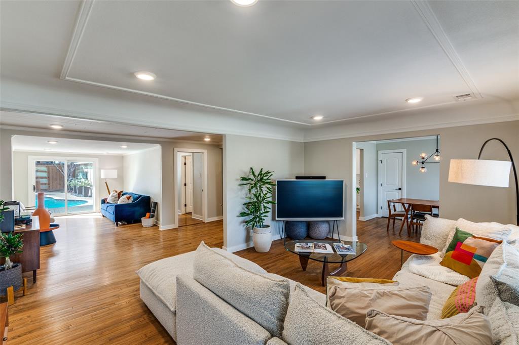 4245 Concho Street Dallas, TX 75206 - Photo 7 of 30 Living area with wood finished floors, recessed lighting, and ornamental molding