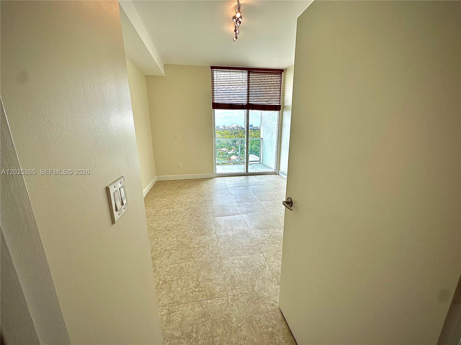 2525 Southwest 3rd Avenue, Unit 705 Miami, FL 33129 - Photo 12 of 26 a view of walk in closet with window