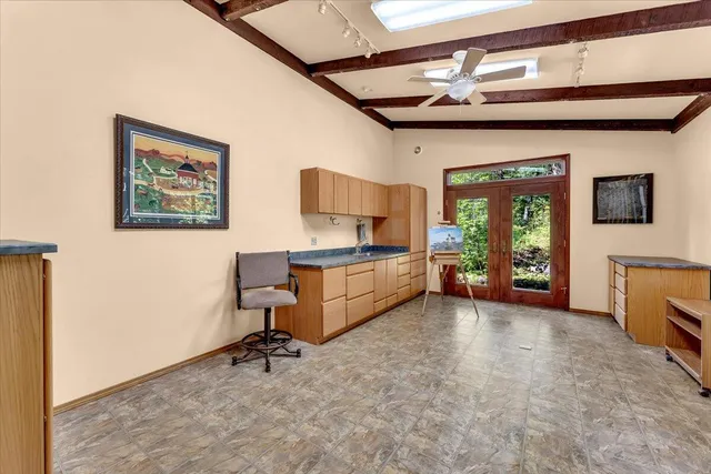 a view of livingroom with furniture and windows