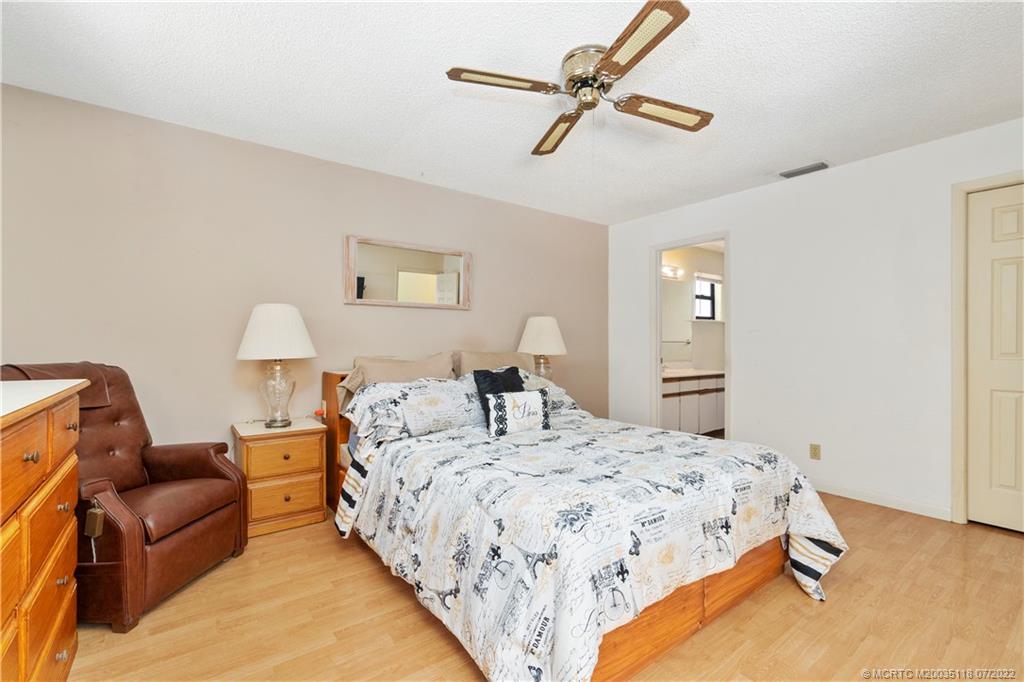 6870 Southeast Raintree Avenue Stuart, FL 34997 - Photo 13 of 28 Main Bedroom
