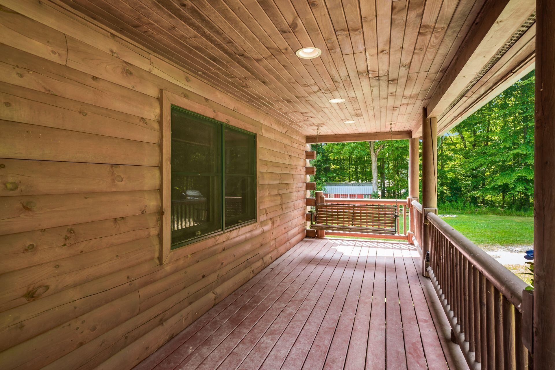 3553 Riley Road Northwest Johnstown, OH 43031 - Photo 4 of 42 COVERED FRONT PORCH WITH SWING