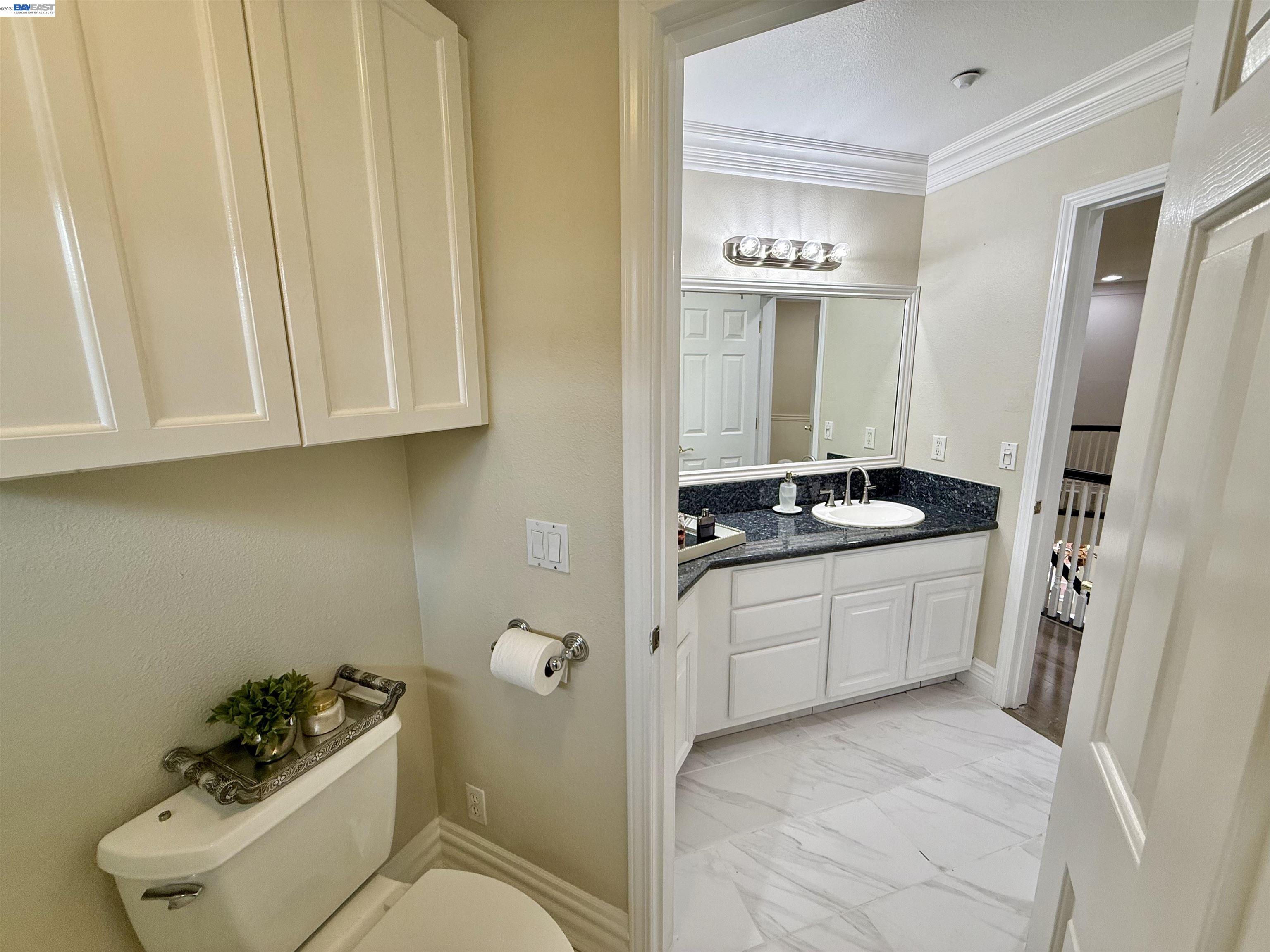 1284 Riesling Circle Livermore, CA 94550 - Photo 63 of 79 a bathroom with a sink and a mirror