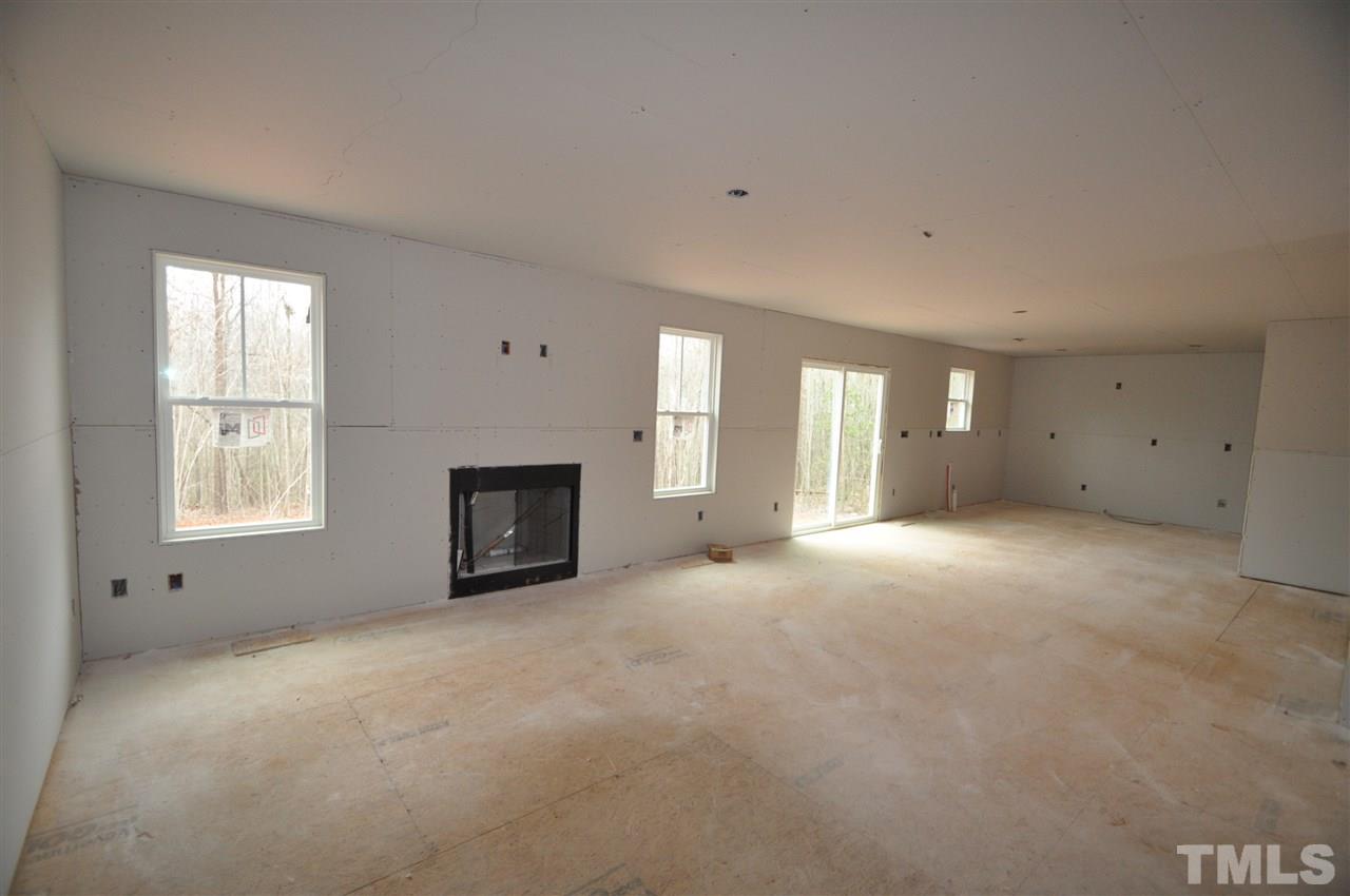 20 Mullins Pond Rd Spring Spring Hope, NC 27882 - Photo 2 of 6 a view of an empty room with a window