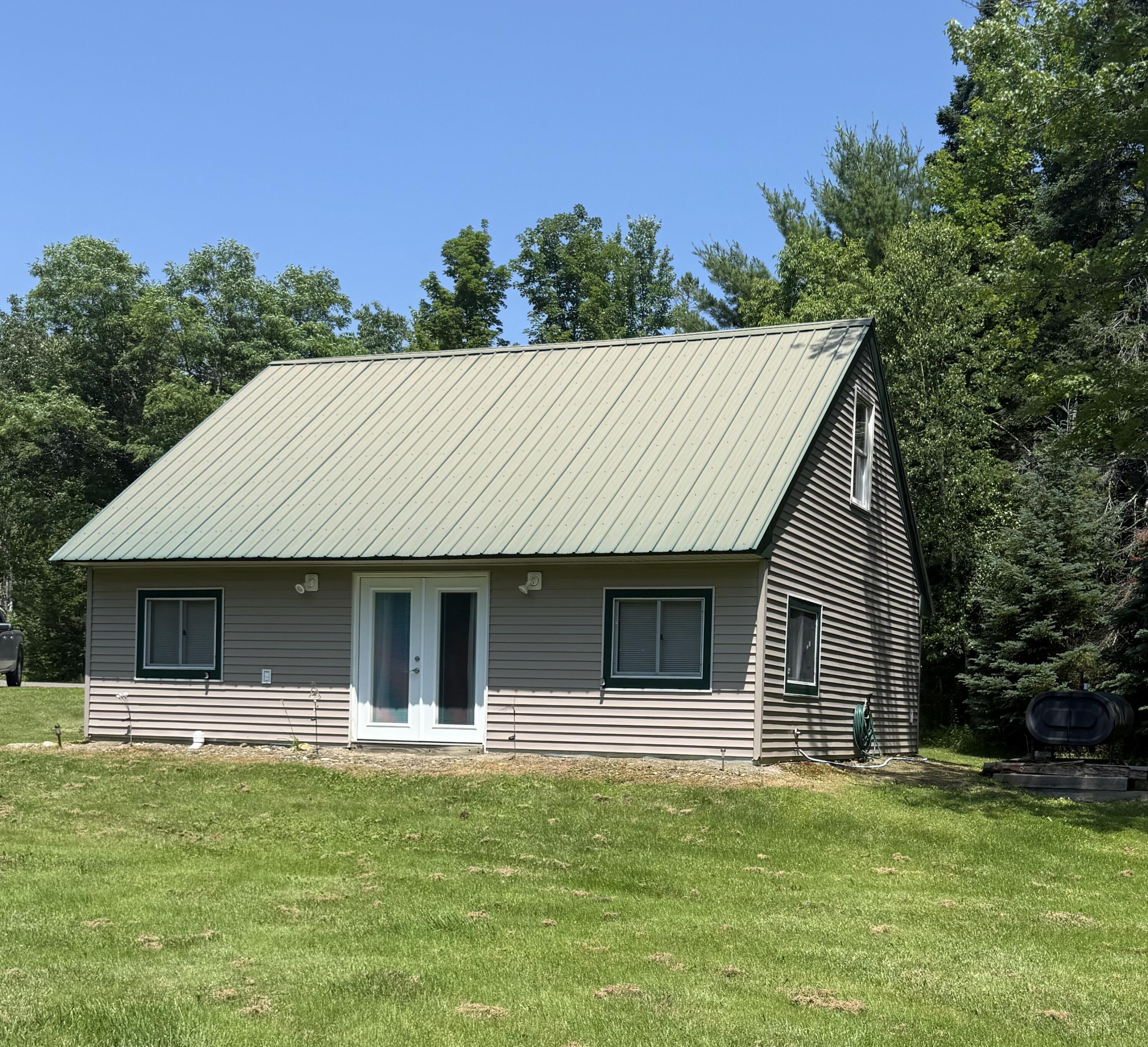 161 Bond Road Corinna, ME 04928 - Photo 1 of 39 back side view of home