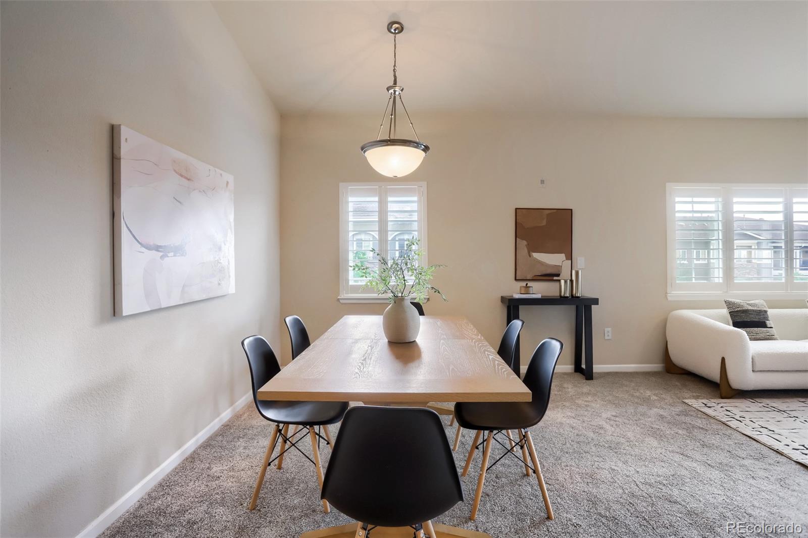 6232 Kilmer Loop, Unit 203 Golden, CO 80403 - Photo 10 of 33 a view of a dining room with furniture and window