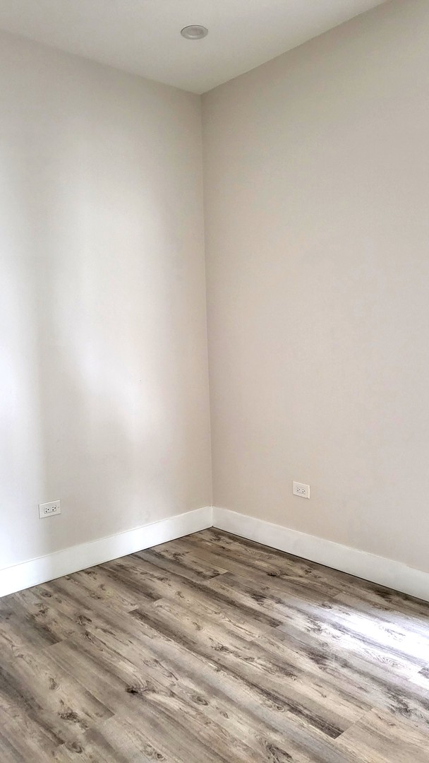 2904 West Nelson Street, Unit 2 Chicago, IL 60618 - Photo 11 of 12 a view of an empty room