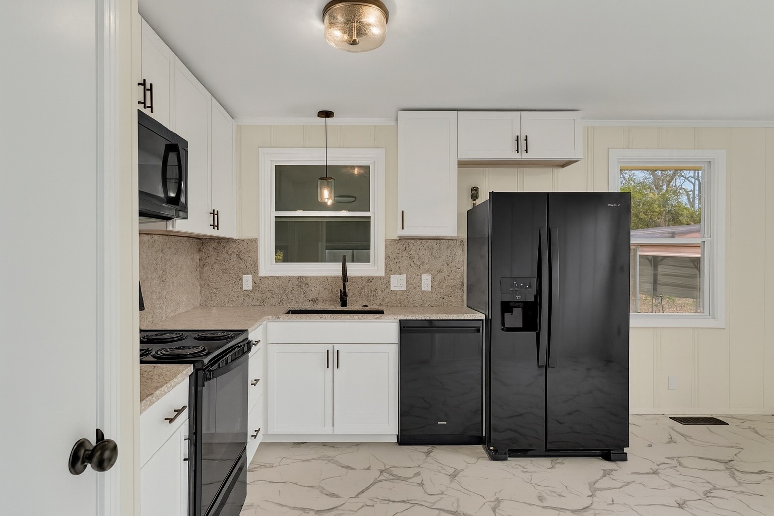 1408 Bain Drive Madison, TN 37115 - Photo 12 of 32 a kitchen with stainless steel appliances granite countertop a refrigerator a stove and a sink